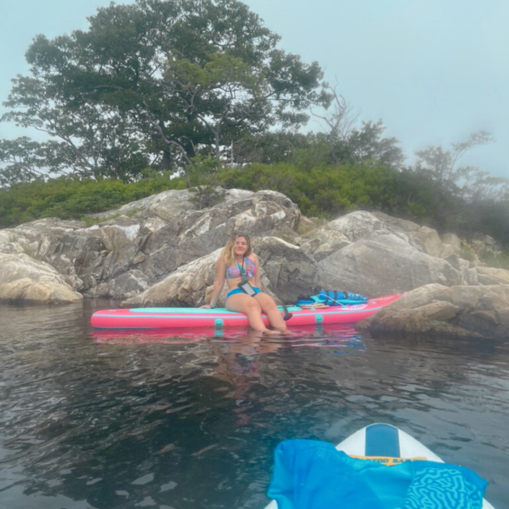 relaxing on a paddleboard listening to music